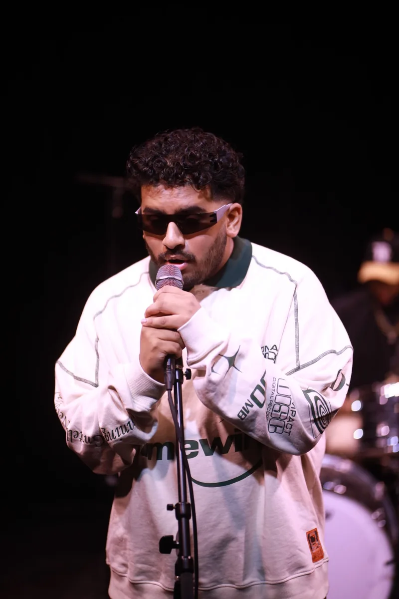 drtyndn performing live with a full band at Front Row Live